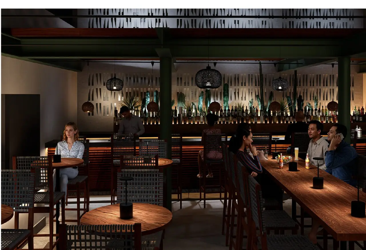 Indoor bar and fire-driven dining atmosphere at N'TRE