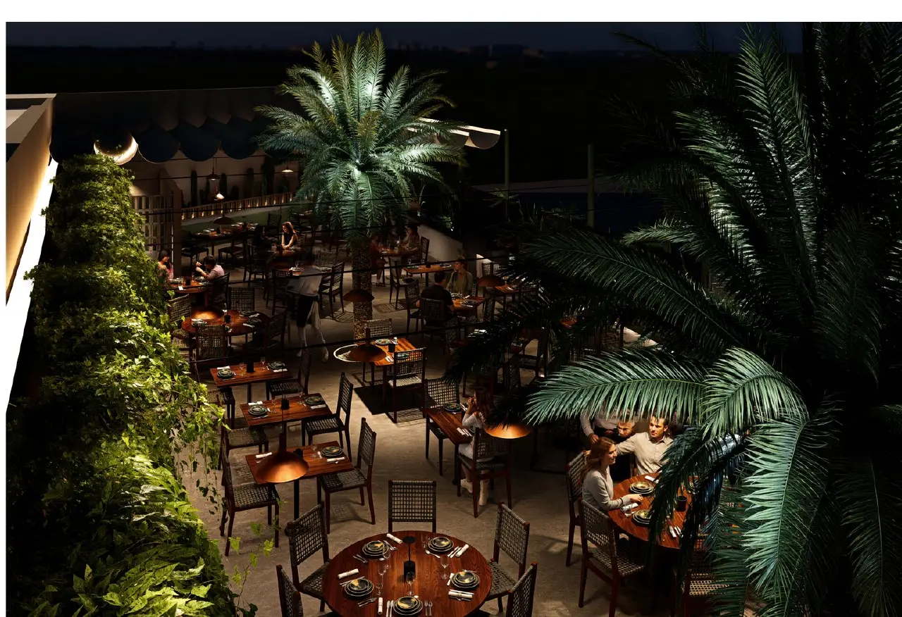 Night view of N'TRE Cocina al Fuego restaurant in Cabo San Lucas
